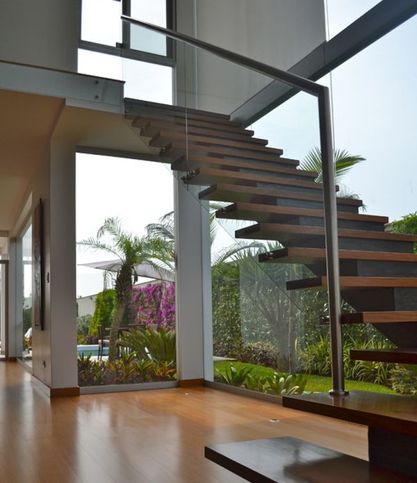 Extensive use of glass in the backdrop provides the ideal setting for this floating stairway