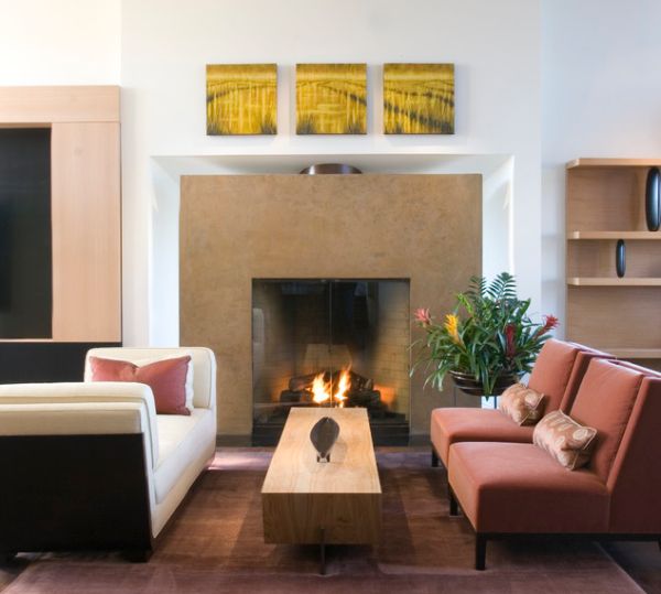 Family room sports a gorgeous fireplace with glass doors