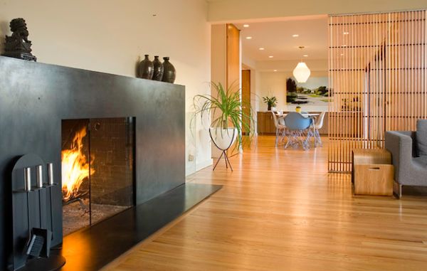 Fireplace surround and mantle add a lovely contrast to a room in neutral tones