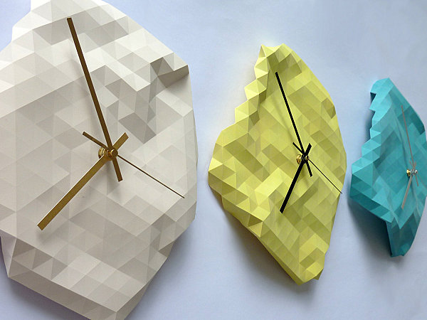 Geometric faceted wall clocks