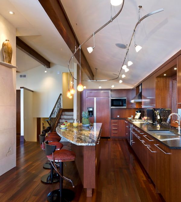 Innovative track lighting installation above the kitchen island