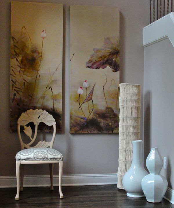 Large white floor vases combine with existing decor and wall art to create an Asian-themed setting