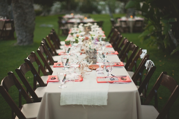 Long party table with neon napkins