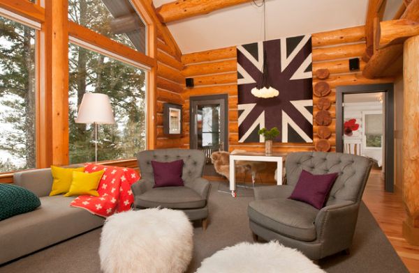 Lovely wall art adds the Union Jack to this modern log cabin in cool colors