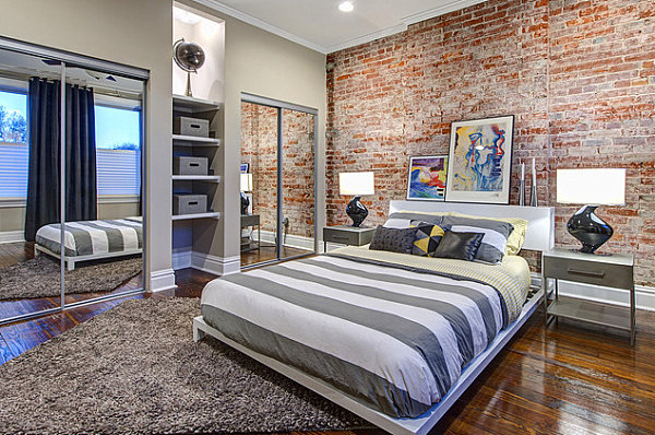 Mirrored closets in a modern industrial bedroom