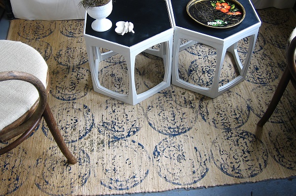 Navy and tan stamped area rug