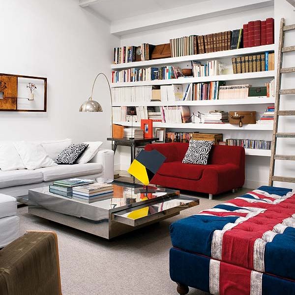 Ottoman in Union Jack colors ideal for a modern home library