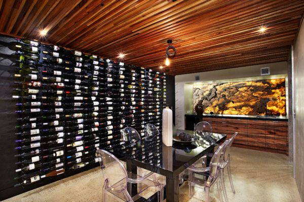 Recycled timber roof and back-lit onyx grace this beautiful wine cellar