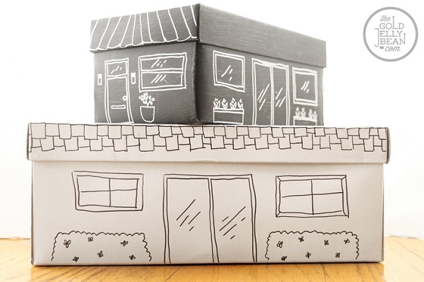 Shoe box toy storage with hand-drawn picture