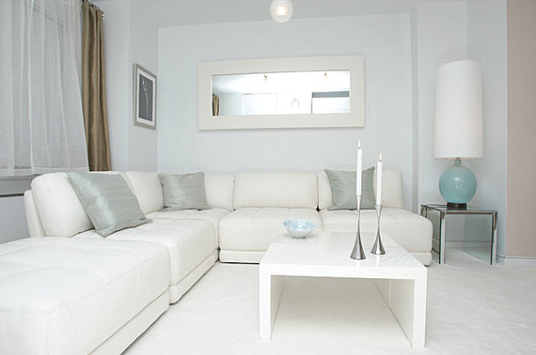 Sparse pastel accents in a gray and white room