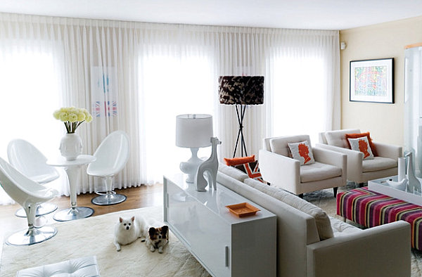 White lacquered furniture in a playfully sophisticated living room