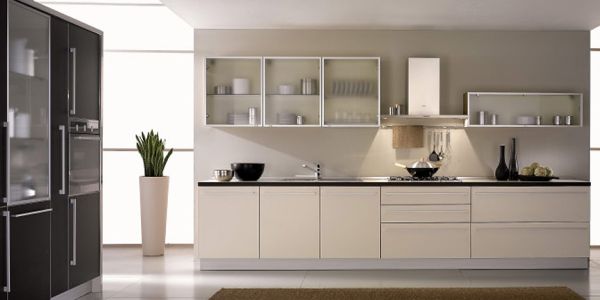 Wonderful use of glass in a black and white kitchen