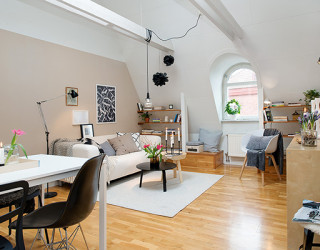Stockholm Attic Apartment Blends Scandinavian Ease With Elegant Interiors