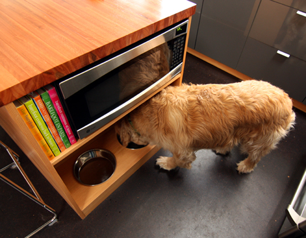 kitchen island with custom built dog feeders