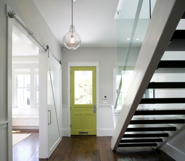 Add drama to the entry way with a green door set in a neutral background