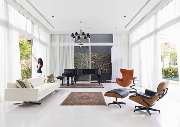 Blend in other iconic pieces of decor along with the Eames Lounge & Ottoman