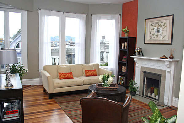 Bright dash of wall color in an eclectic living room