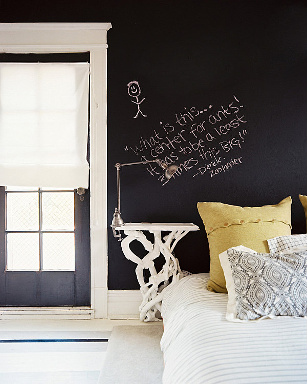 Chalkboard walls in a masculine bedroom