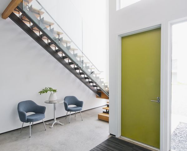 Chic entrance with greenish-yellow interior door