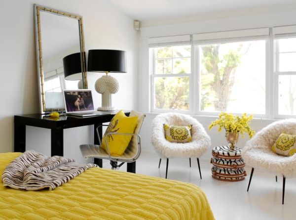 Chic yellow and white bedroom gets a touch of black with the stylish lampshade