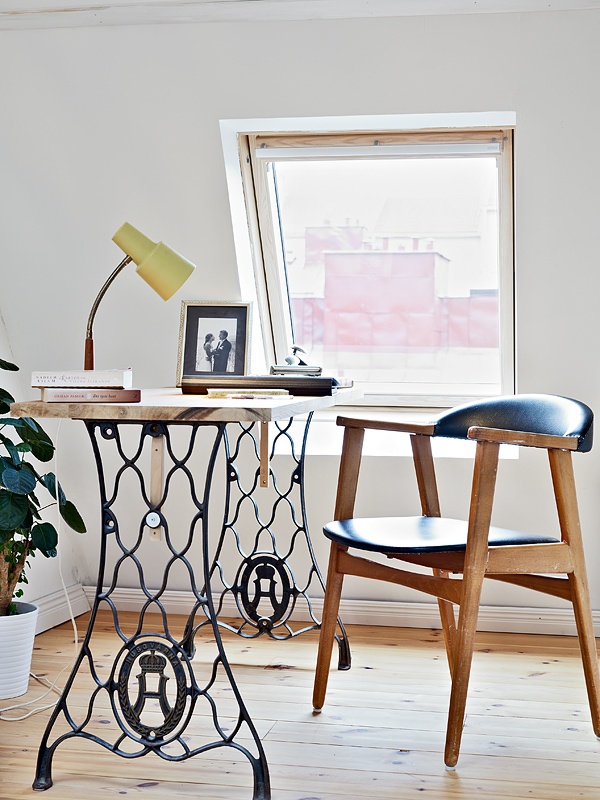 Computer desk with antique sewing machine legs