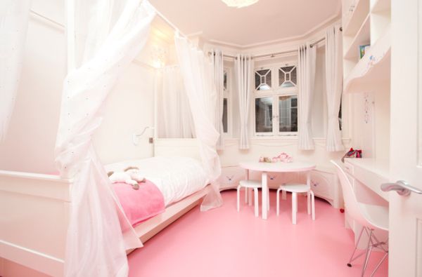 Contemporary girls' bedroom in pristine white and pretty pink