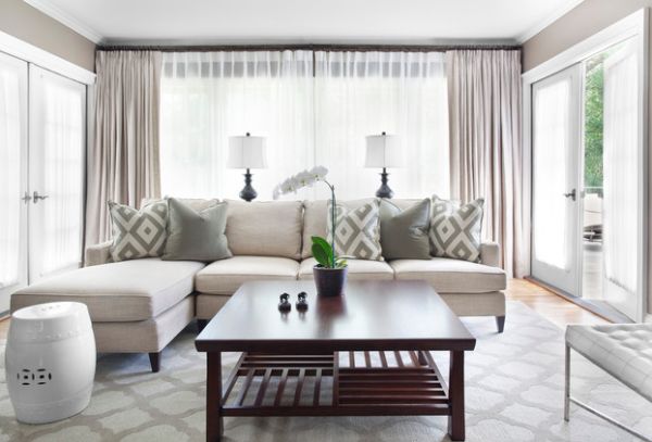 Contemporary living room in white and grey with potted plant for contrast