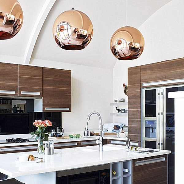 Copper pendant lights in a modern kitchen