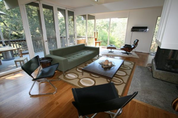 Create a relaxed family area with a couch and the Eames Lounger