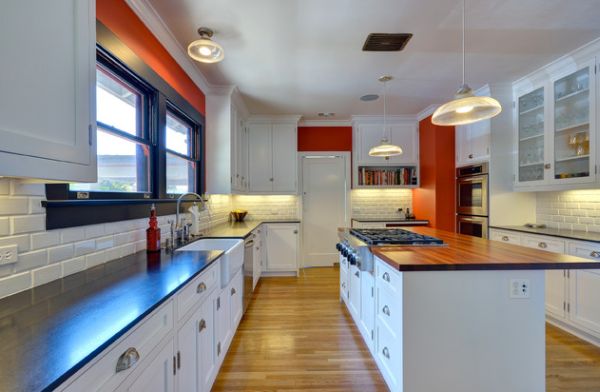 Dash of orange in the kitchen to complement the white backdrop