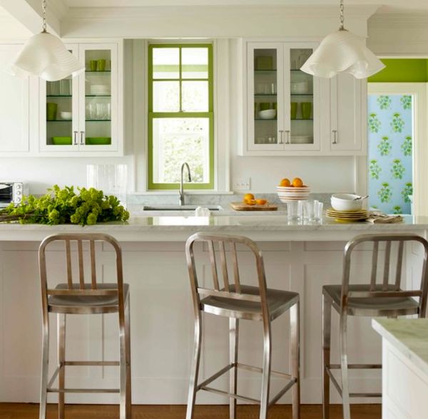 Dishware, painted window frame and fresh veggies add green to the kitchen subtly