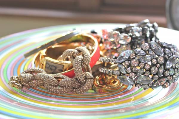 Glass dish of bracelets