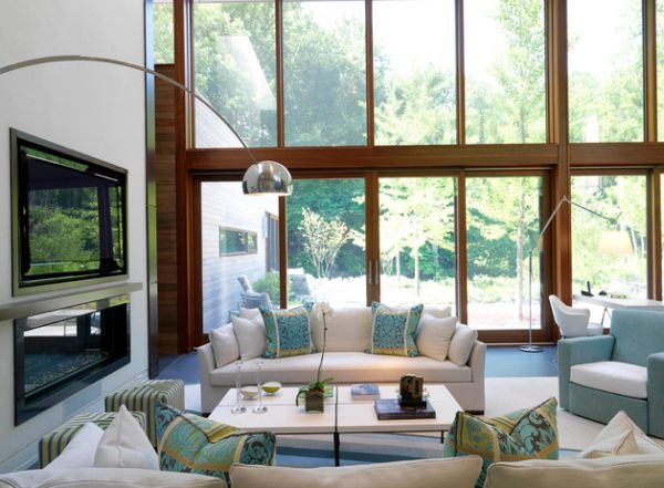 Gorgeous living room in white and blue with a floor lamp that accentuates its relaxing ambience