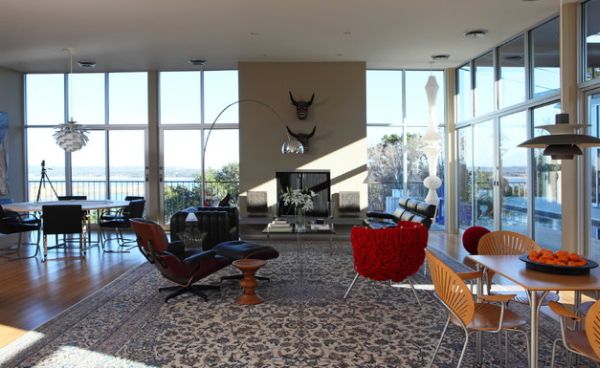 Gorgeous living space sporting the Arco Floor Lamp along with the Eames lounge chair and walnut stool