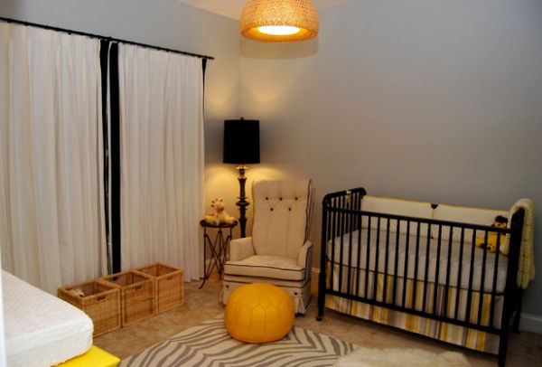 Gorgeous nursery with floor lamp in the corner sporting black lampshade