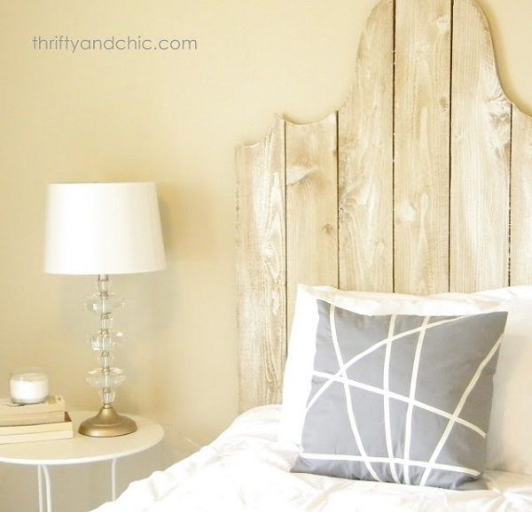 Gray and white pillow with crossed lines