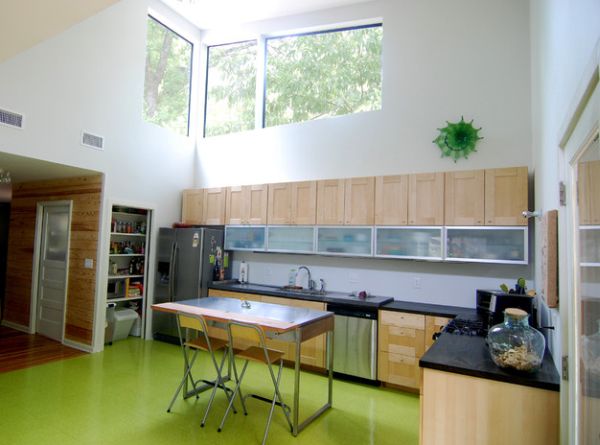 High gloss flooring in green presents a unique way to splash the kitchen with color!