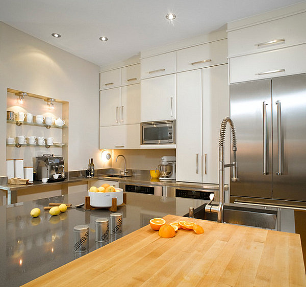 Labeled canisters in a stainless steel kitchen