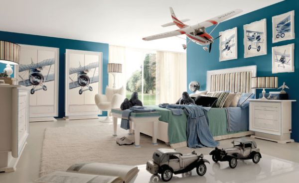 Let your kid fly high with aviation themed bedroom in white and blue