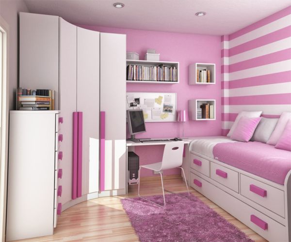 Modern girls' bedroom with white cabinets and striped backdrop