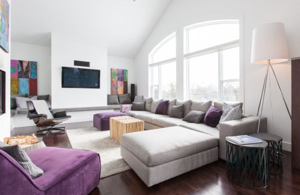 Modern living room in grey with a balanced addition of purple