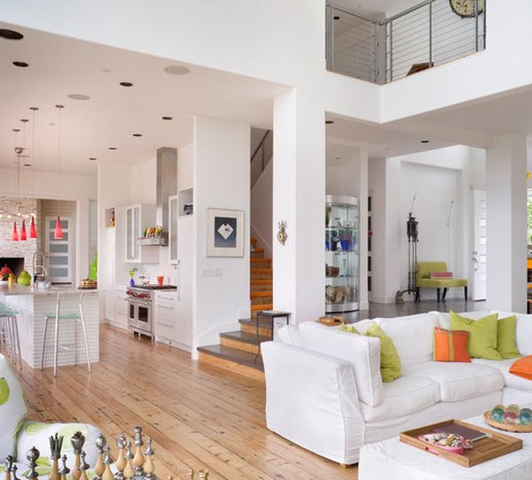 Open floor plan uses orange and green along with white