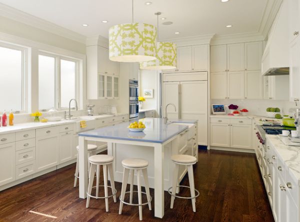 Pendant lights above the kitchen island and some fresh apples bringing the green!