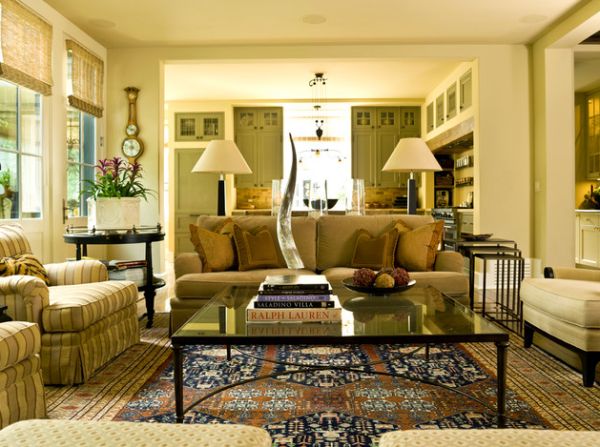 Pottery Barn floor lamps stand out in this green and white living space