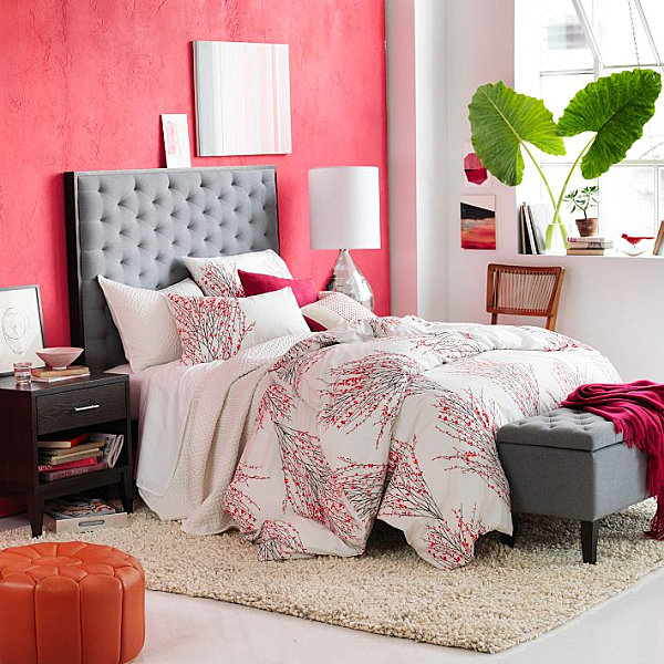 Red wall color and duvet cover accents