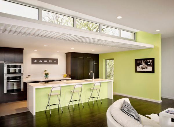 Slender modern kitchen lit up gorgeously with a gentle shade of light lemon green