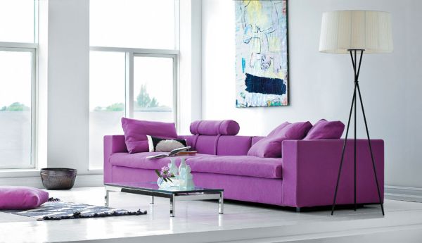 Sometimes all you need is a couch in purple to liven up a bland setting!