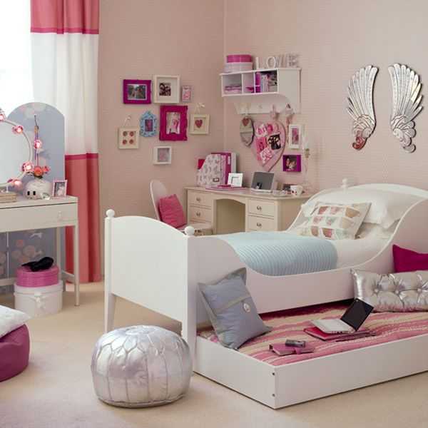 Sophisticated girls' bedroom sports a couple of shiny surfaces to bring in the chic appeal