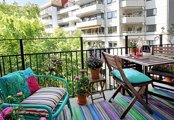 Striped textiles on a small balcony