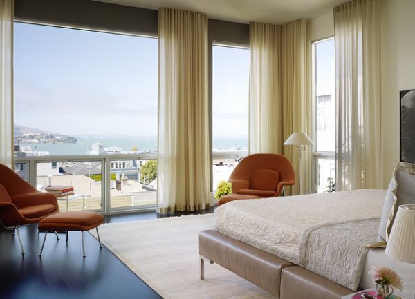 Stunning modern bedroom with a view sports a stylish and vintage floor lamp